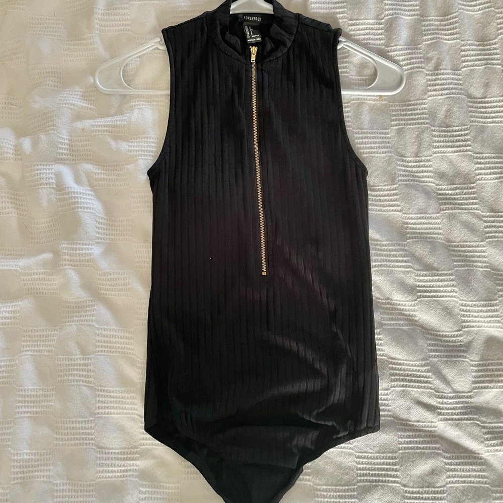 Black zip up turtle neck body suit. Never worn!